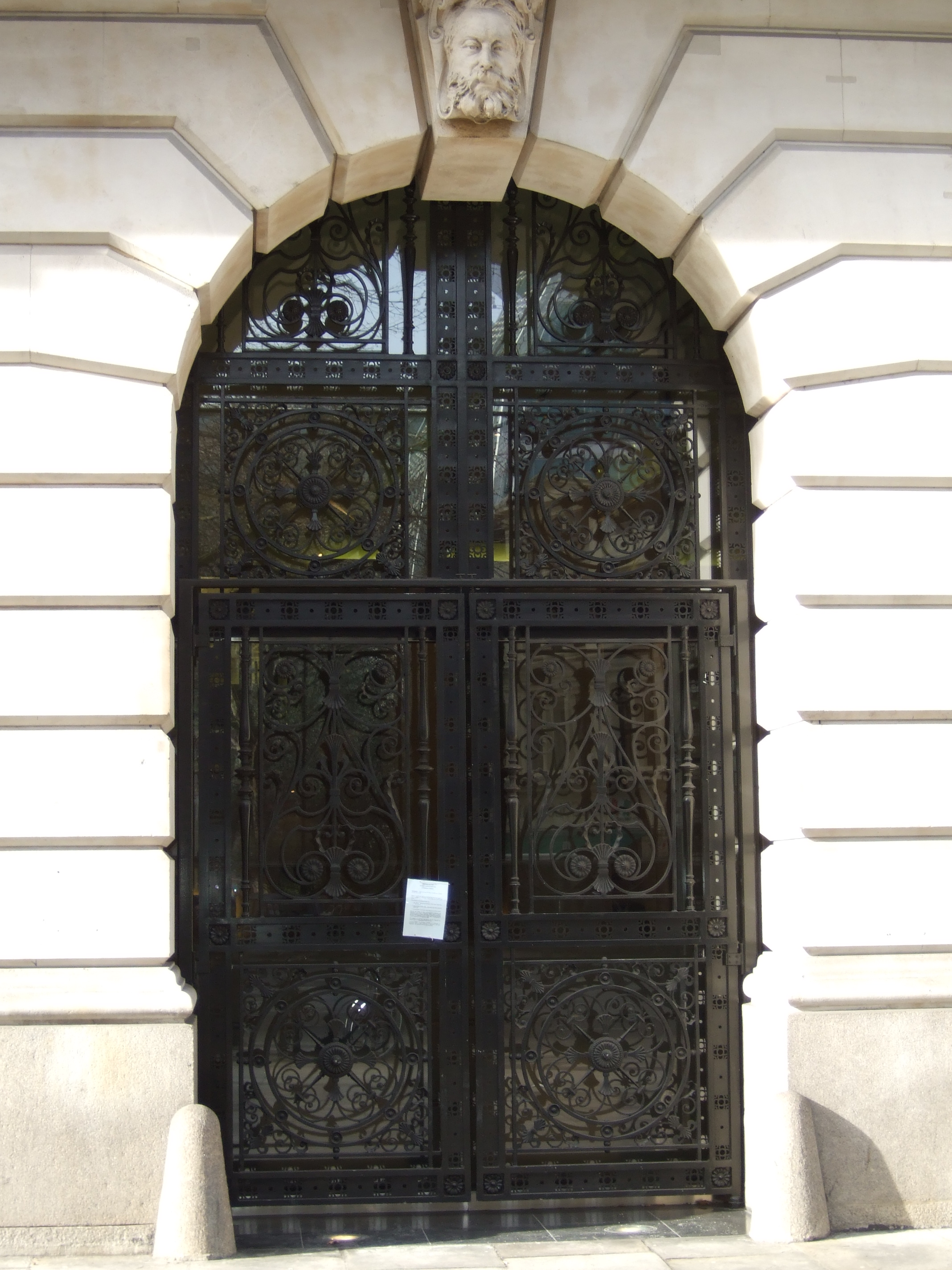 Former Telegraph Office entrance featuring a mascaron keystone
